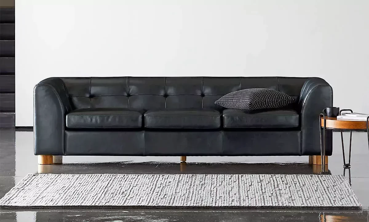 Kotka Black Leather Sofa highlights the high-end aristocratic temperament