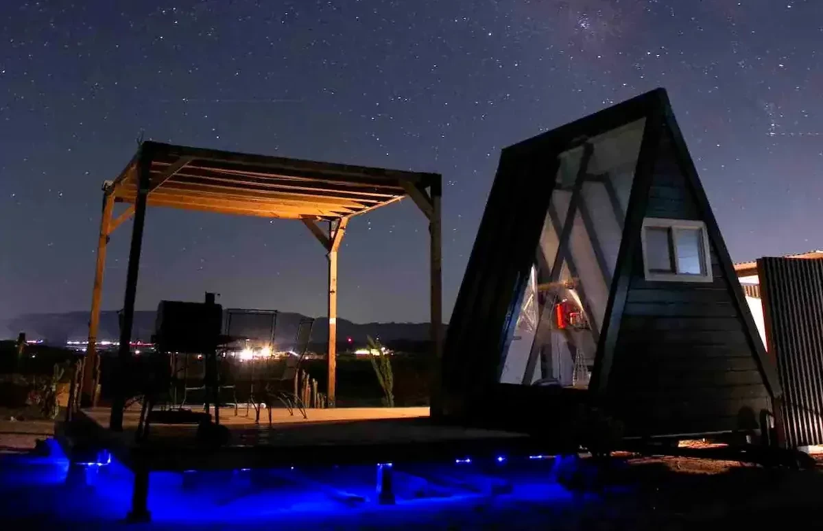The A-Frame House in Joshua Tree at night